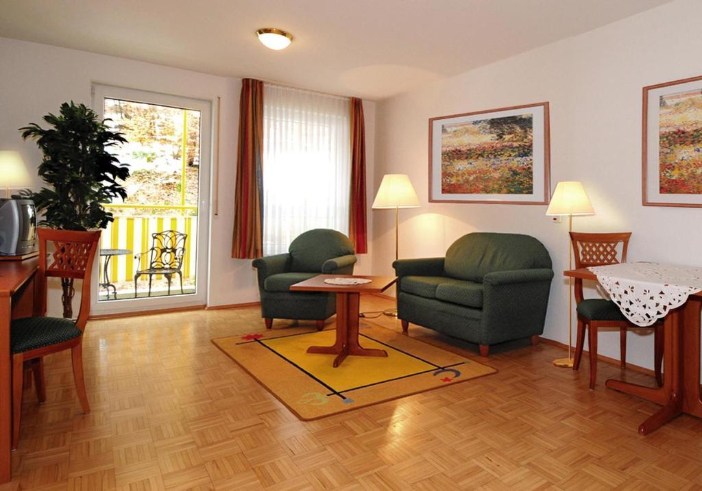 Hotel & Residenz Am Kurpark Schlangenbad Rom bilde